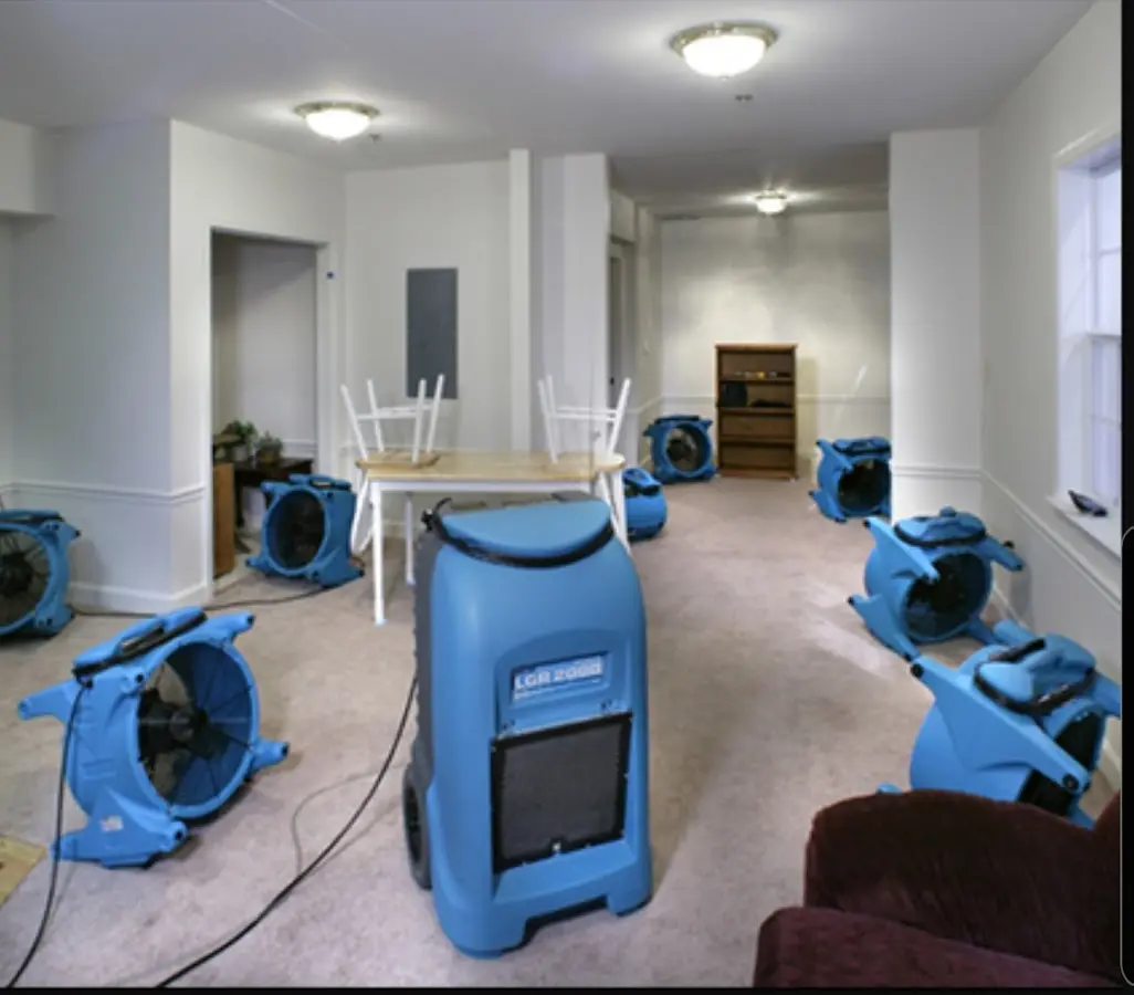 Air movers and dehumidifier setup for Water Damage Restoration in Cedar Grove